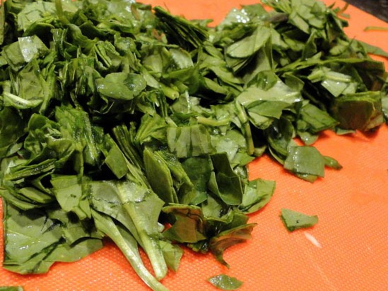 How is spinach used Is spinach harmful